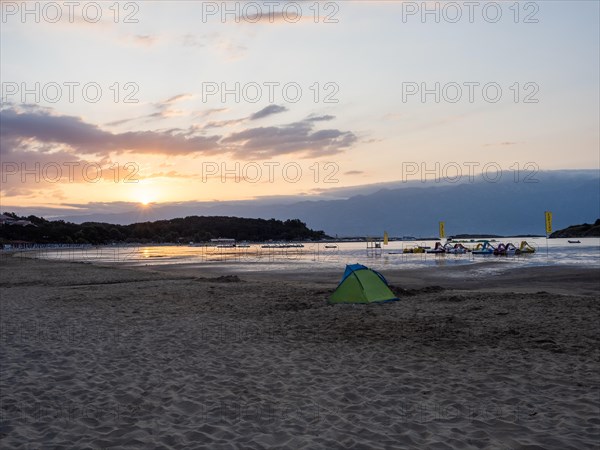 Morning atmosphere on the beach at sunrise, Lopar, island of Rab, Kvarner Gulf Bay, Croatia, Europe