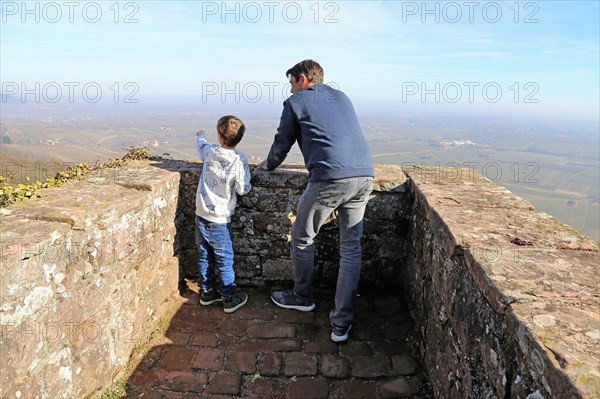 Father and son enjoy the view from Madenburg Castle, Palatinate