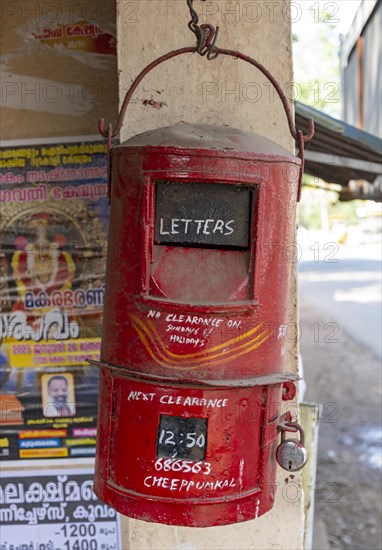 Typical traditional red postbox, Kerala, India, Asia