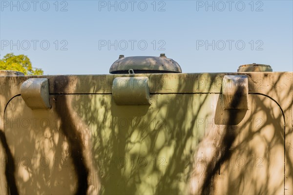 Hinges on back hatch of armored personal carrier on display in public park