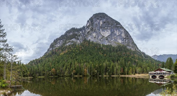 Pflegersee with inn under a cloudy sky, Garmisch-Partenkirchen, Werdenfelser Land, Upper Bavaria, Bavaria, Germany, Europe