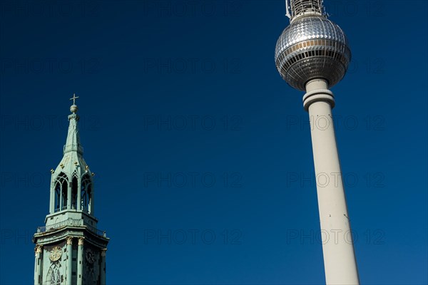 TV tower with Marienkirche, East Germany, GDR, landmark, landmark, building, modern, building, urban, progress, symbol, symbolic, view, dome, blue sky, radio tower, television, centre, Alexanderplatz, Berlin, Germany, Europe