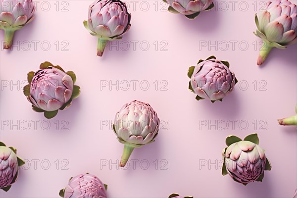 Top view of artichokes on pink background. KI generiert, generiert AI generated