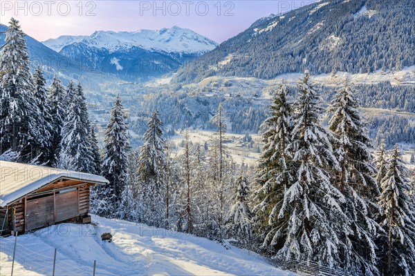 Winter landscape with view into the valley to the village and Radhausberg 2613m from the Gasteiner Hoehenweg, Bad Gastein, Gastein Valley, Hohe Tauern National Park, Salzburg Province, Austria, Europe