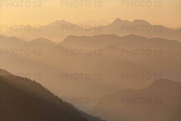 Mountain peak in the haze, sunrise, summer, view from Jochberg to Bavarian Alps, Upper Bavaria, Bavaria, Germany, Europe
