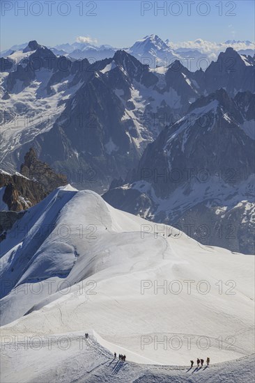 Climber on glacier in front of mountains, group, Mont Blanc massif, Chamonix, French Alps, France, Europe