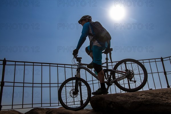 Mountain bikers on the viewing platform at Orensfels, Palatinate Forest