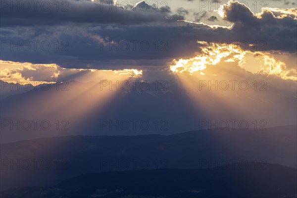 Thunderstorm mood over mountains, backlight, sunbeams, summer, view from Schlern to Sarntaler Al, Dolomites, South Tyrol, Italy, Europe