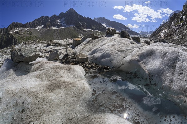 Mountain peak with glacier in sunshine, snowmelt, climate change, Argentiere glacier, Mont Blanc massif, French Alps, Chamonix, France, Europe