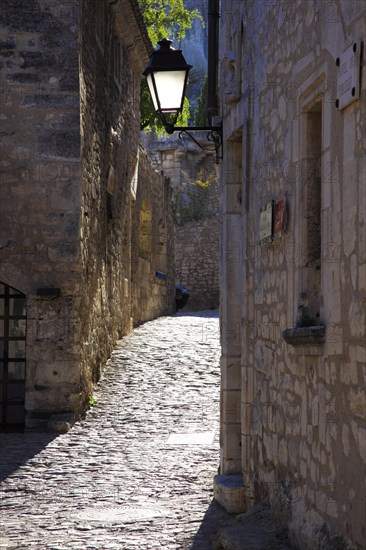 Les Baux-de-Provence Light-flooded alley, Provence, France, Europe