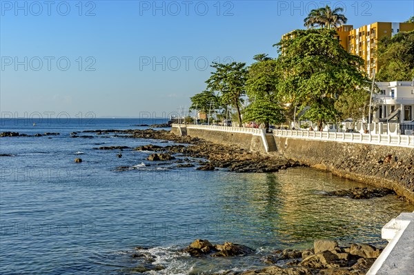 Porto da Barra neighborhood waterfront in the city of Salvador in Bahia with its buildings facing the sea, Salvador, Bahia, Brasil