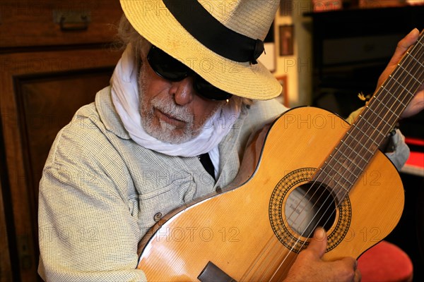 Guitar player, musician plays the guitar