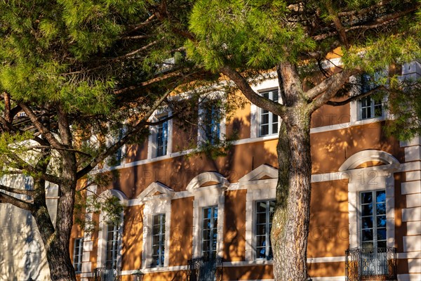 Old Beautiful Town with Shadows on Building and Trees in a Sunny Day in Morcote, Ticino, Switzerland, Europe