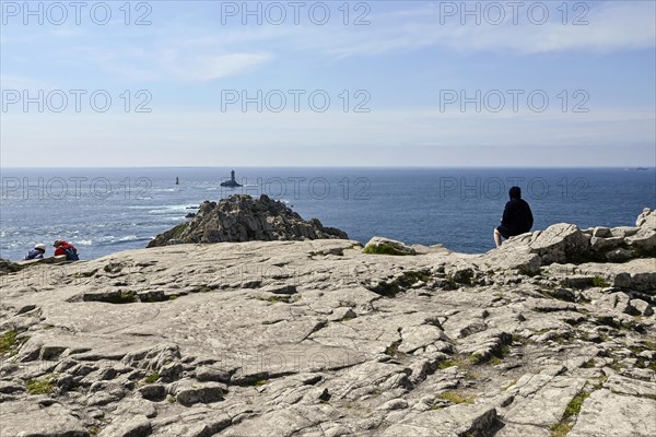 Atlantic Ocean in front of the rocks at Pointe du Raz, Plogoff, Finistere, Brittany, France, Europe