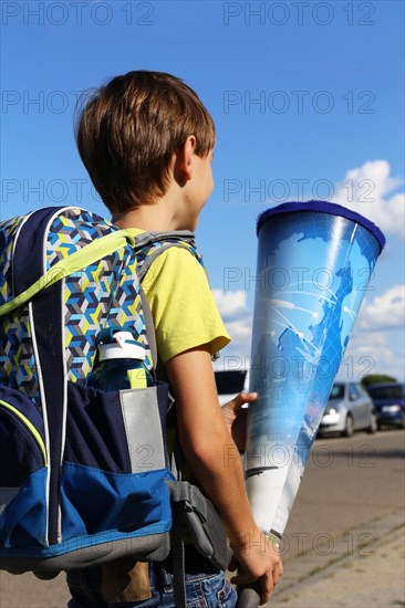 Child on the way to his first day of school, (Mutterstadt, Rhineland-Palatinate)