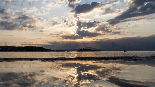 Morning atmosphere on the beach at sunrise, reflection, panoramic shot, Lopar, island of Rab, Kvarner Gulf Bay, Croatia, Europe