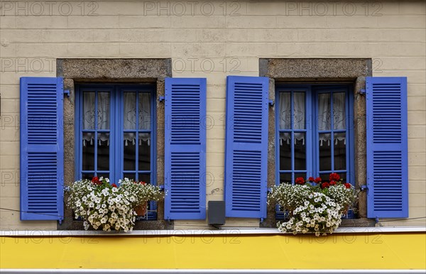House facade with two windows, blue window frames and blue shutters, Roscoff, Bretagne, France, Europe