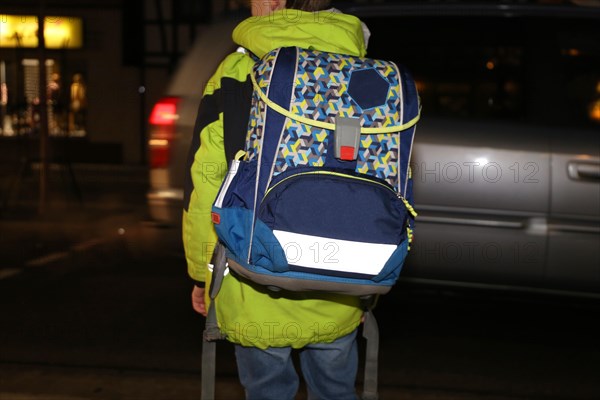 Schoolchild in traffic in the dark, (Mutterstadt, Germany, 26/01/2020), Europe