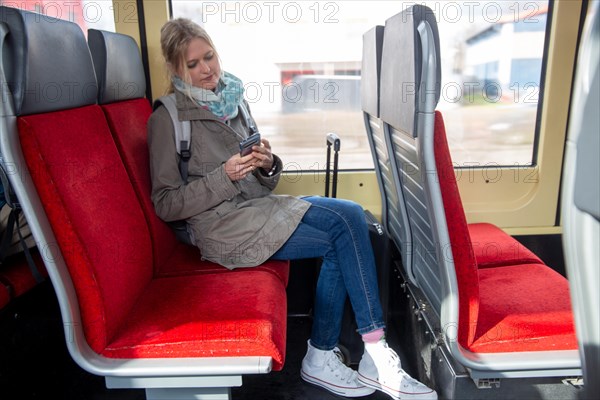 Young woman on a train