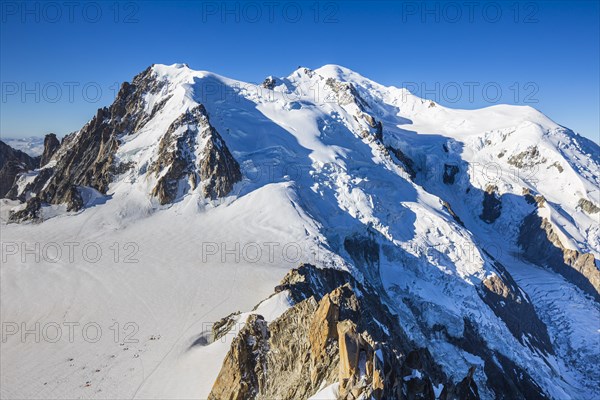 Mountain peak with glacier in sunshine, view from Aiguille du Midi to Mont Blanc, Mont Blanc massif, French Alps, Chamonix, France, Europe