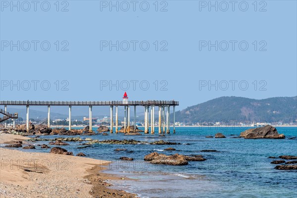 Pedestrian pier with lighthouse replica for photo-ops