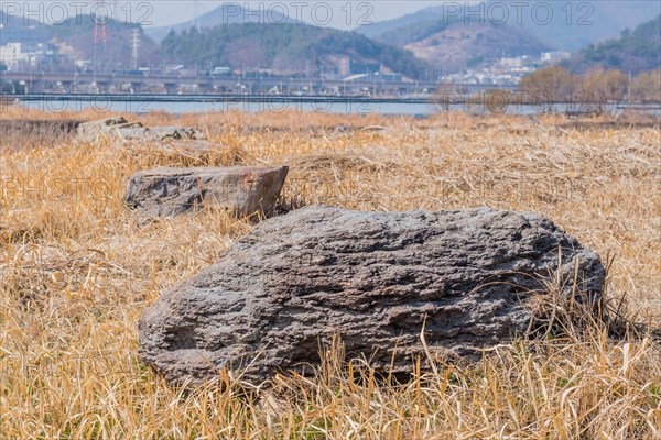 Closeup of large boulders used in construction of stone fortress in Yeosu, South Korea, Asia