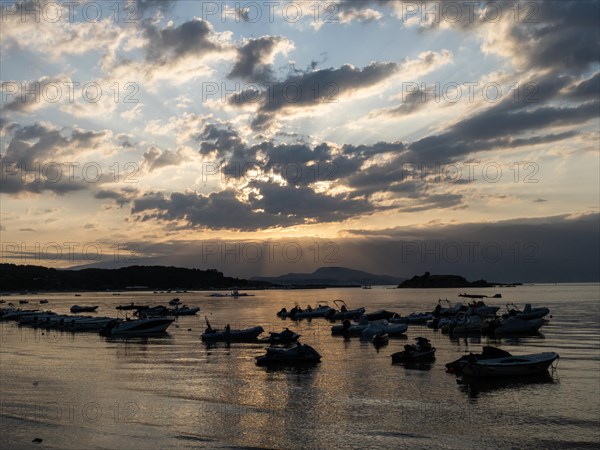 Boats at anchor, morning atmosphere on the beach at sunrise, Lopar, island of Rab, Kvarner Gulf Bay, Croatia, Europe