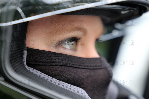 Racer with helmet and balaclava