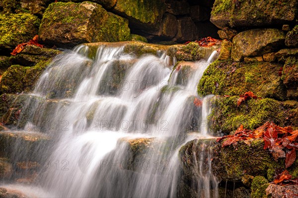 Waterfall in the Rautal forest in Jena in winter, Jena, Thuringia, Germany, Europe