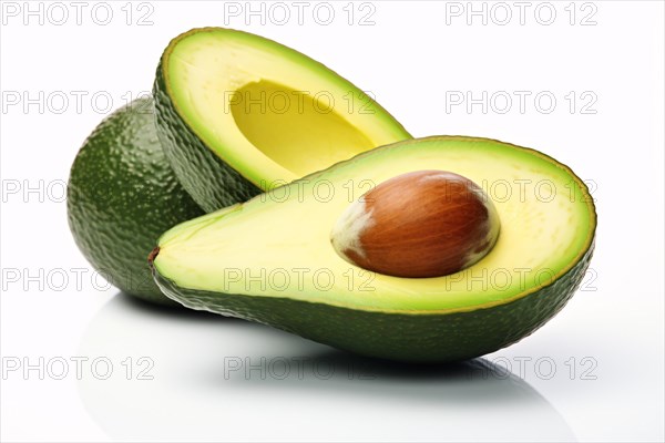 Halved avocados on white background. KI generiert, generiert AI generated