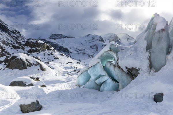 Glacier tongue in front of a mountain peak, snow, winter, Morteratsch glacier, Pontresina, Engadin, Grisons, Switzerland, Europe