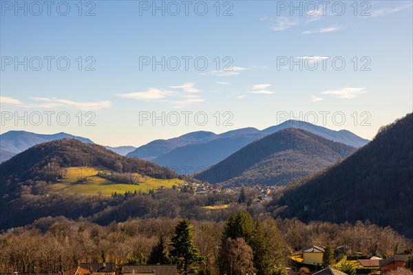 Beautiful Mountain Range with Sky and Sunlight in Malcantone, Miglieglia, Ticino, Switzerland, Europe