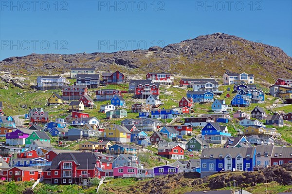 Colourful wooden houses, barren mountains, Qaqortoq, Greenland, Denmark, North America