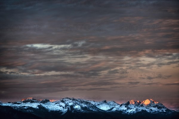 Mountain landscape in the sunset with cloudy sky, mountains, mountain, alpine, evening sky, cloud, weather, panorama, cloudy sky, nature, landscape, tourism, travel, mountain landscape, alpenglow, mountain panorama, Swiss Alps, Valais, Switzerland, Europe