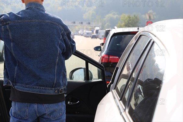 Traffic jam on the motorway with exemplary emergency lane (A 7 near Aalen, Baden-Wuerttemberg)