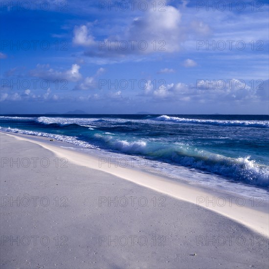 Seychelles, Fregate, clear blue water and white sandy beach, Africa