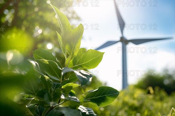 Green leaves with blurry wind mill turbine in background. Nature and renewable energy concept. KI generiert, generiert AI generated
