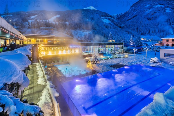 Snow-covered rock spa in winter, thermal bath at dusk, Bad Gastein, Gastein Valley, Hohe Tauern National Park, Salzburg Province, Austria, Europe