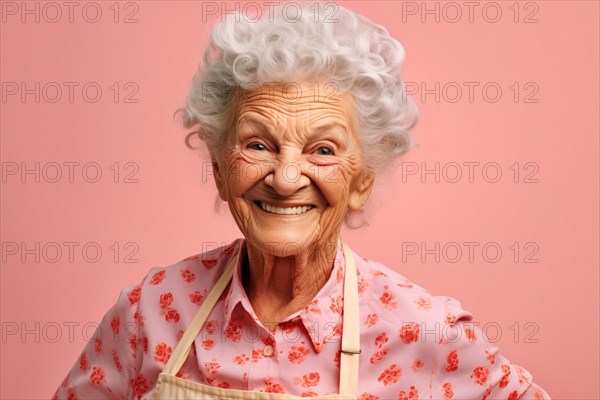 Elderly woman with apron in front of pink background. KI generiert, generiert AI generated