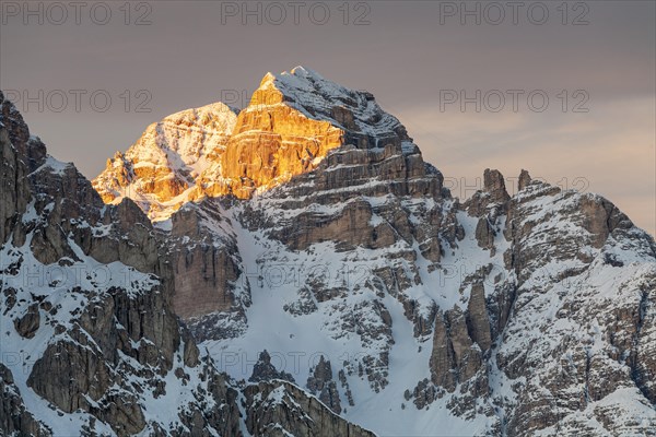 Mountain peak at sunrise, winter, snow, Tofana, Dolomites, Belluno, Italy, Europe