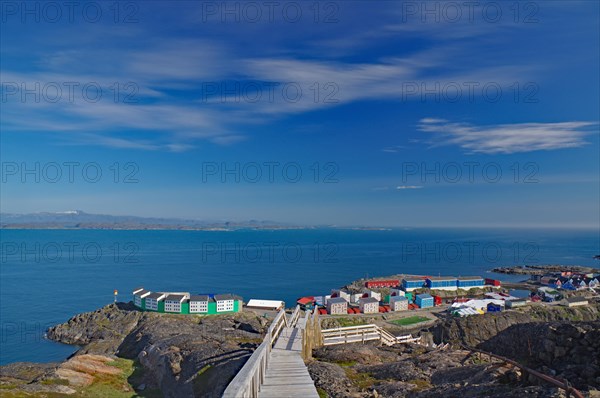 View over parts of the town, wooden stairs and the sea, Maniitsoq, Greenland, Denmark, North America