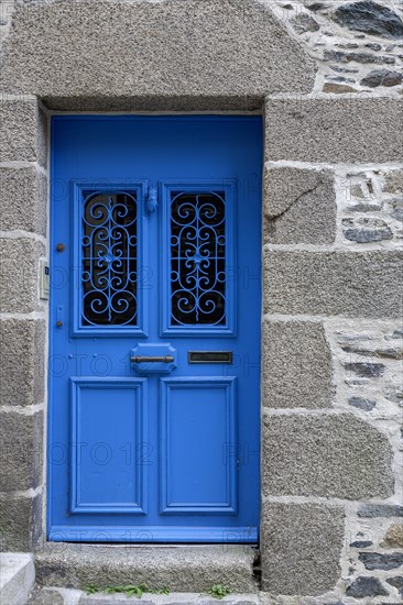 Natural stone house facade with a blue entrance door, Morlaix, Departements Finistere, Brittany, France, Europe