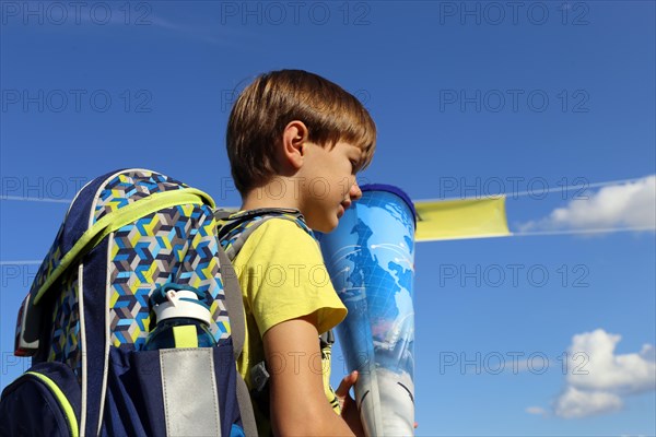 Child on the way to his first day of school, (Mutterstadt, Rhineland-Palatinate)