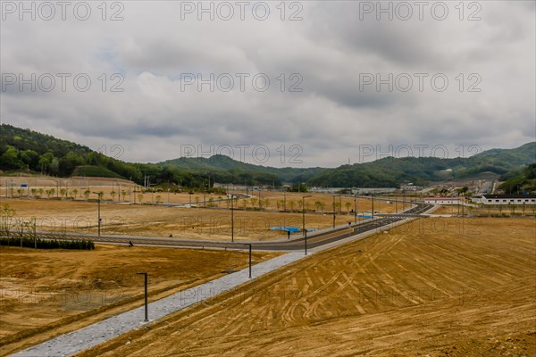 Landscape of construction site for new subdivision on cloudy day