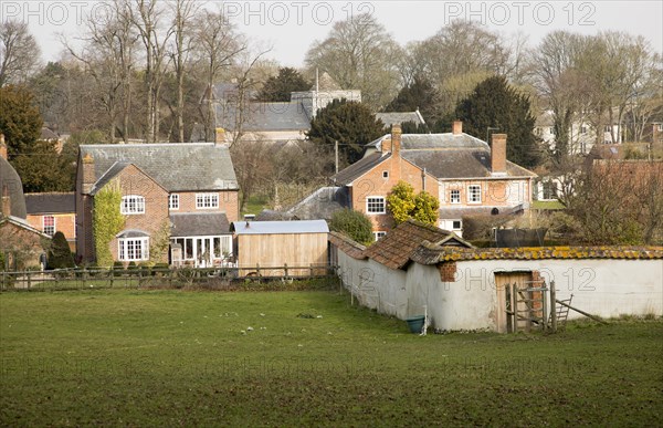 Buildings in valley floor of Tilshead village, Wiltshire, England, UK