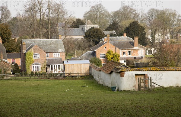 Buildings in valley floor of Tilshead village, Wiltshire, England, UK