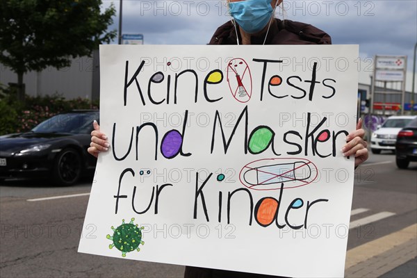 Rally against the corona measures: Demonstrators express their criticism of the corona policy with an authorised sign campaign in Industriestrasse in Ludwigshafen