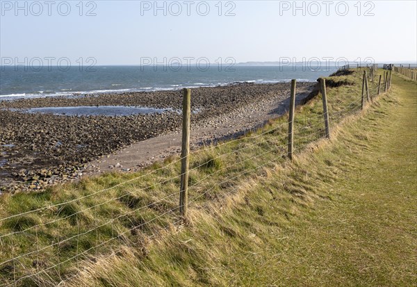 Coastline landscape scenery looking south towards Farne Islands, Holy Island, Lindisfarne, Northumberland, England, UK