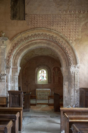 Medieval frescoes church of Saint Mary, Kempley, Gloucestershire, England, UK, Norman chancel arch