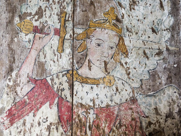 Medieval painting church of Saint Lawrence, South Cove, Suffolk, England, UK Saint Michael sword raised triumphing over a dragon